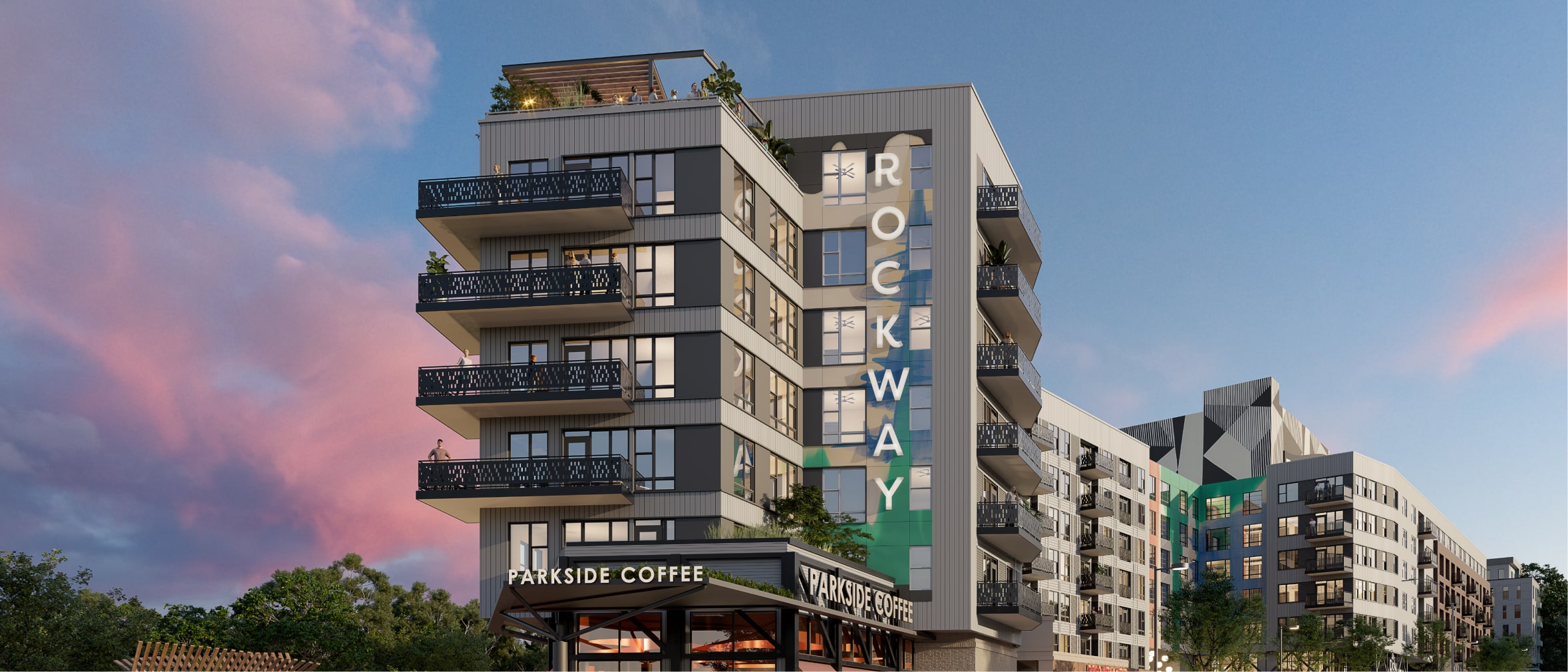 An exterior street level view looking up to the Rockway building and Parkside Coffee